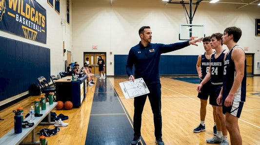 Basketball coach explaining paint attack strategy